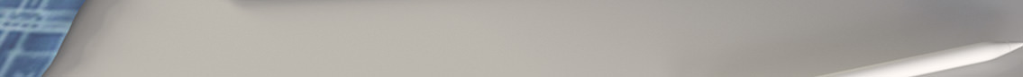 Bottom slice of a grey background; part of a desk.